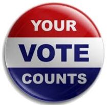 a red white and blue stripped button that says your vote counts