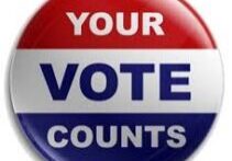 a red white and blue stripped button that says your vote counts